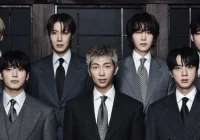 BTS retorna aos EUA com performance histórica no AMAs 2026 e mira em prêmios após hiato militar